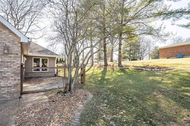 view of yard with fence