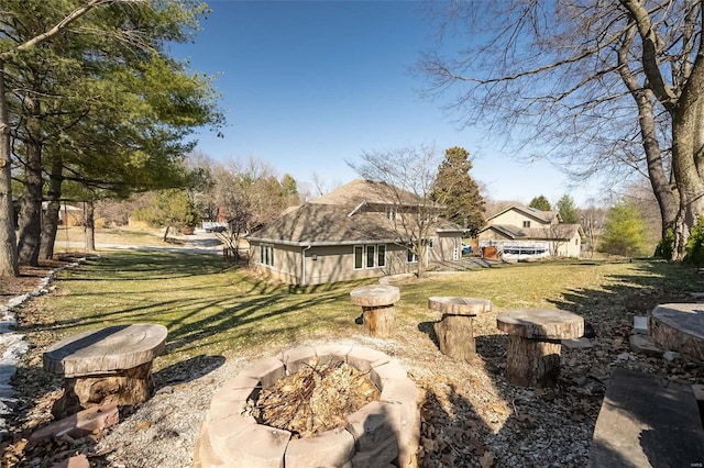 view of yard featuring a fire pit