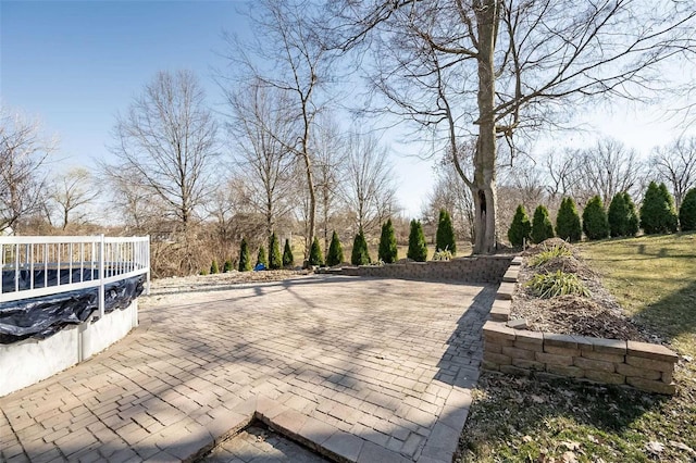 exterior space with a covered pool