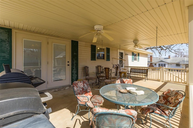 view of patio / terrace featuring outdoor dining space and a ceiling fan