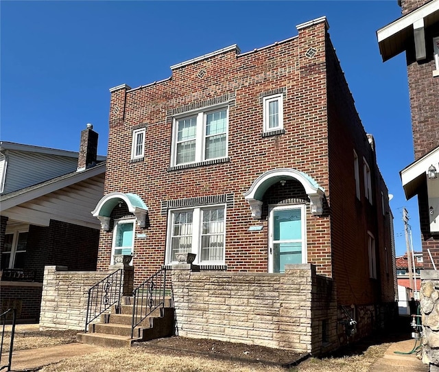 view of front facade with brick siding