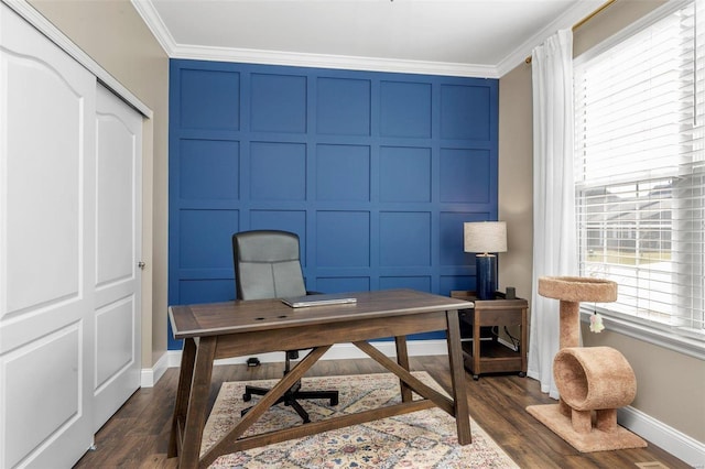 home office with ornamental molding, dark wood finished floors, a decorative wall, and baseboards