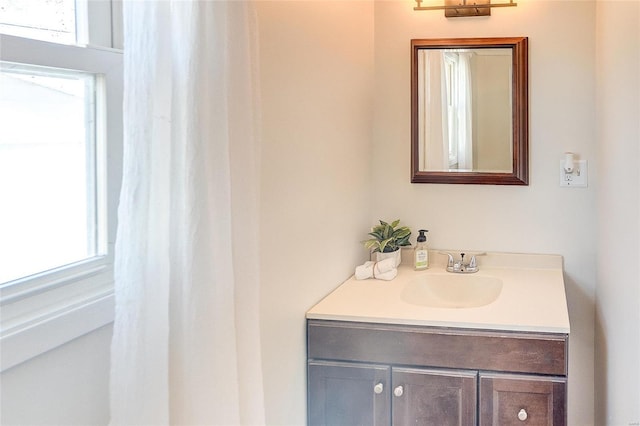 bathroom featuring vanity and plenty of natural light