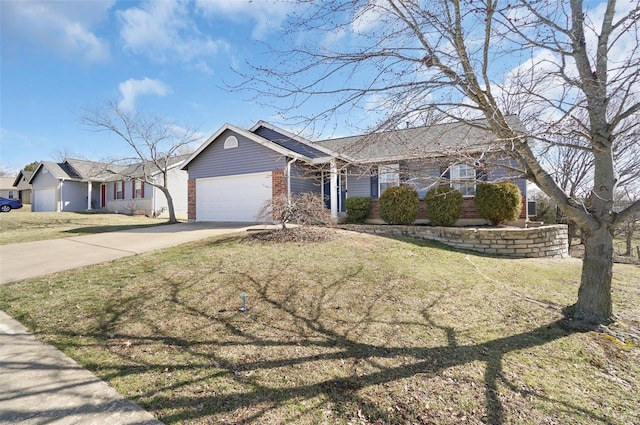 single story home with a garage, a front lawn, brick siding, and driveway