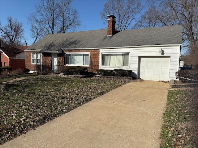 view of front of property with brick siding, a chimney, a shingled roof, an attached garage, and driveway