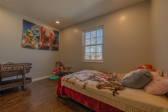 bedroom featuring dark wood-type flooring, recessed lighting, and baseboards