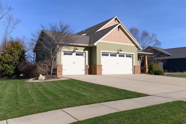 view of front of house with a garage, brick siding, concrete driveway, and a front yard