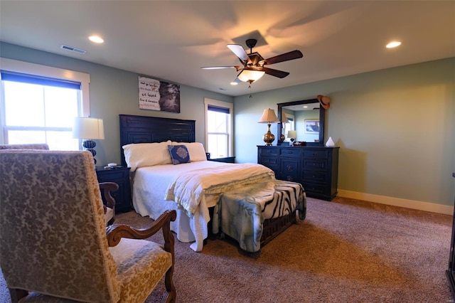 carpeted bedroom with recessed lighting, visible vents, baseboards, and a ceiling fan