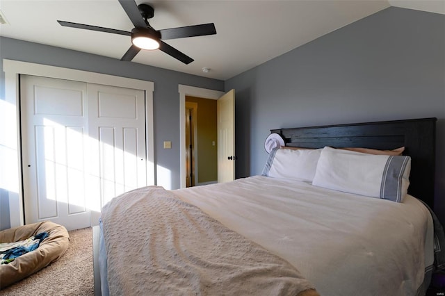 bedroom with a ceiling fan and a closet