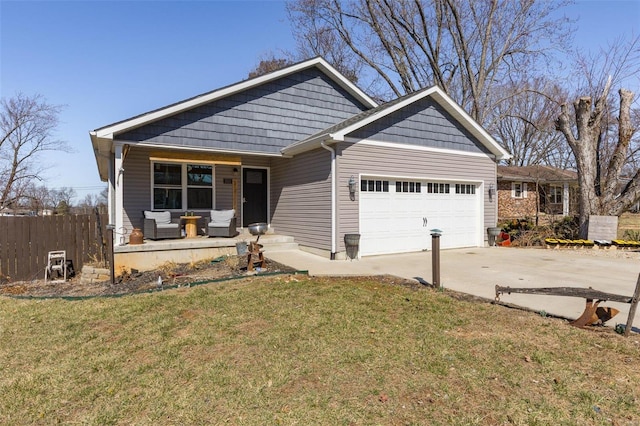 view of front facade with covered porch, concrete driveway, a front yard, fence, and a garage