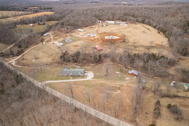 birds eye view of property featuring a rural view