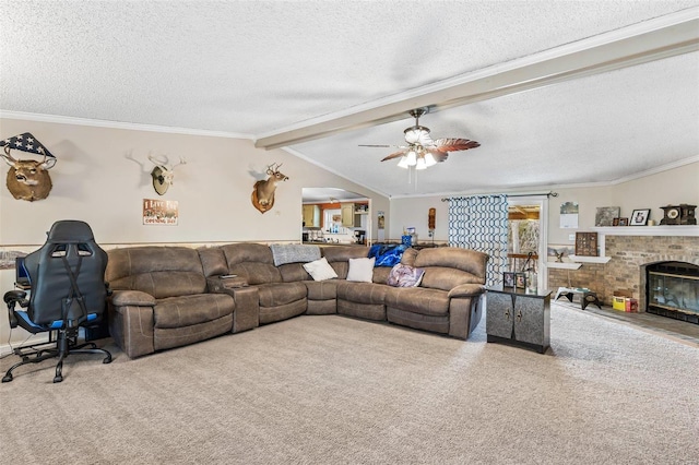 living room featuring vaulted ceiling with beams, a brick fireplace, ornamental molding, and a textured ceiling