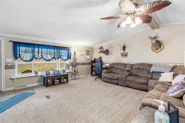 living area featuring vaulted ceiling with beams, a textured ceiling, visible vents, ornamental molding, and carpet