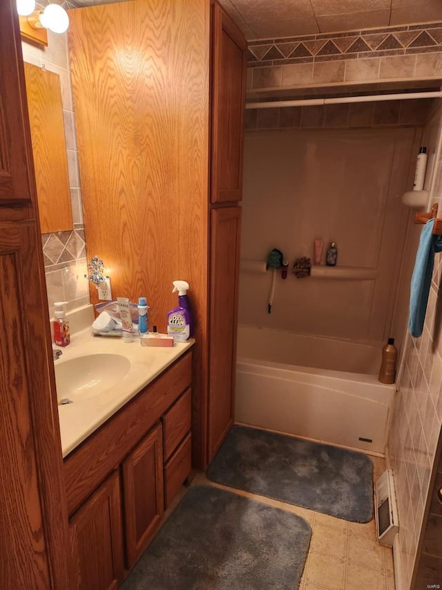 full bathroom featuring shower / bath combination, tile patterned floors, visible vents, and vanity