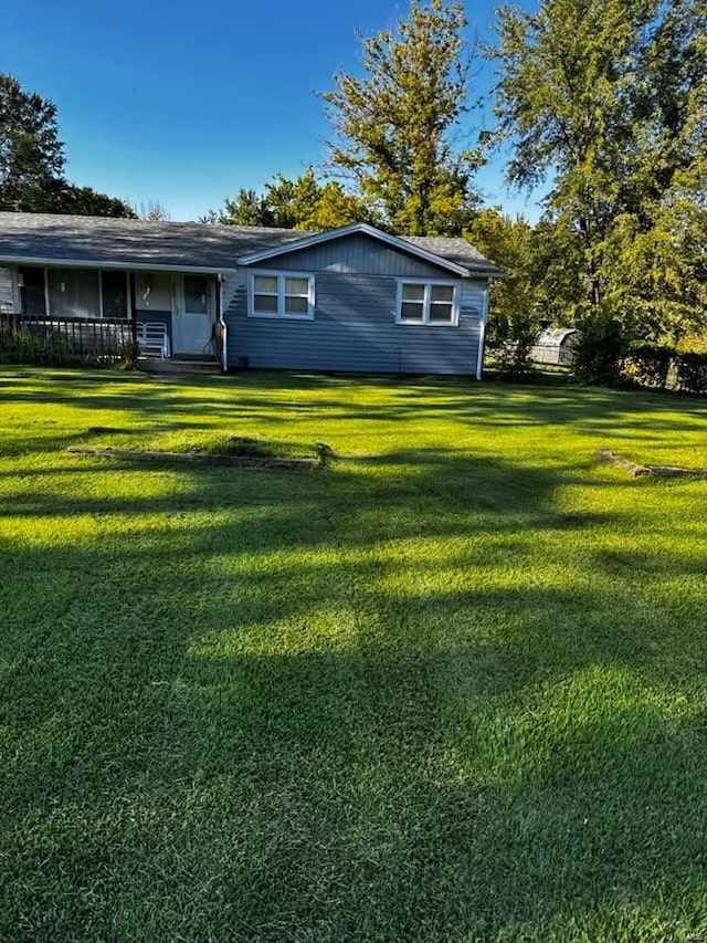 exterior space featuring a front yard