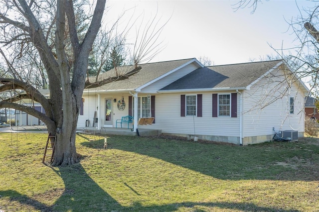 single story home with central AC, a porch, a shingled roof, and a front lawn