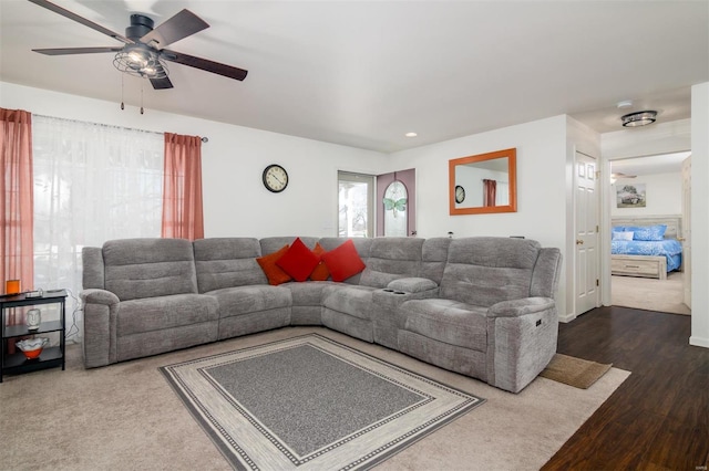 living room featuring dark wood-type flooring, recessed lighting, and ceiling fan