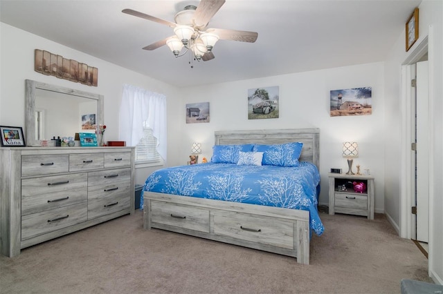 carpeted bedroom with a ceiling fan