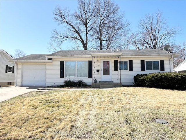 single story home with a garage, a front lawn, and concrete driveway