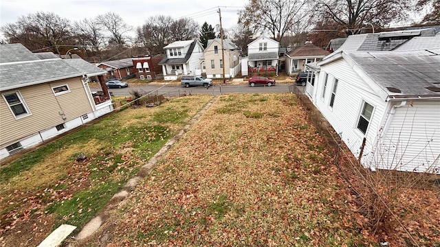 view of yard featuring a residential view