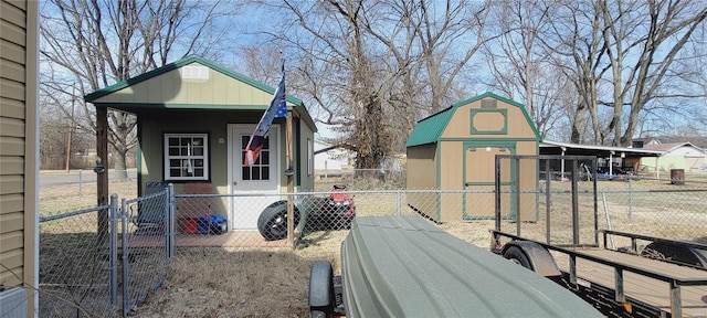 view of jungle gym with an outdoor structure and fence