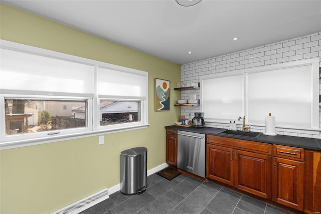 kitchen with open shelves, dark countertops, baseboard heating, a sink, and dishwasher