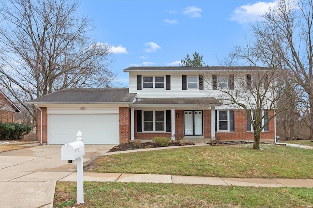 traditional home featuring a front yard, brick siding, driveway, and an attached garage