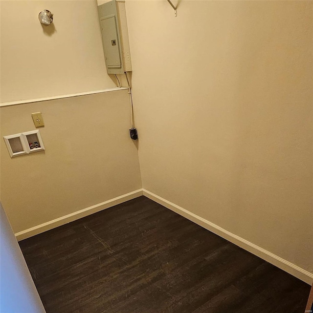 washroom with washer hookup, laundry area, baseboards, and dark wood-style flooring