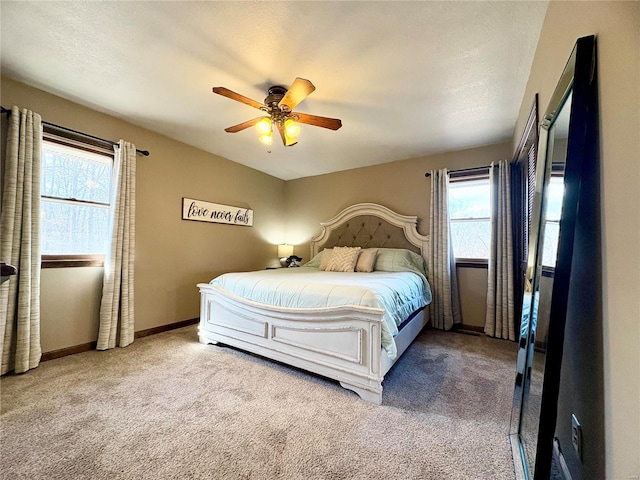 bedroom featuring carpet flooring, ceiling fan, and baseboards