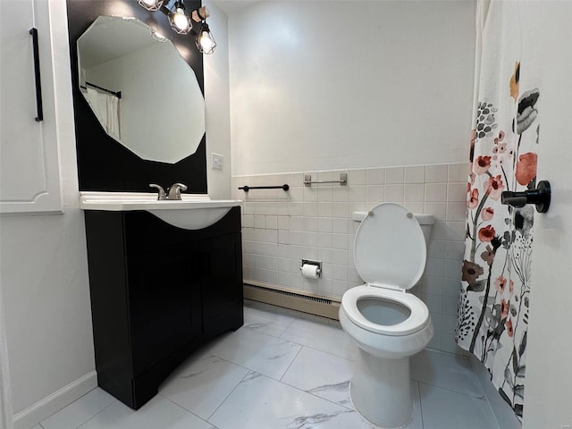 full bathroom featuring tile walls, toilet, marble finish floor, vanity, and a baseboard radiator