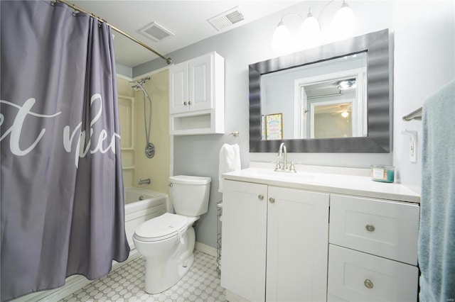 bathroom featuring visible vents, shower / bath combination with curtain, toilet, and vanity