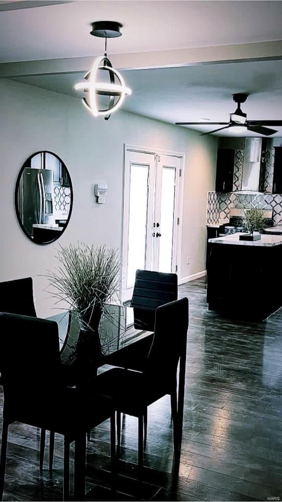 dining room with dark wood finished floors, french doors, baseboards, and ceiling fan