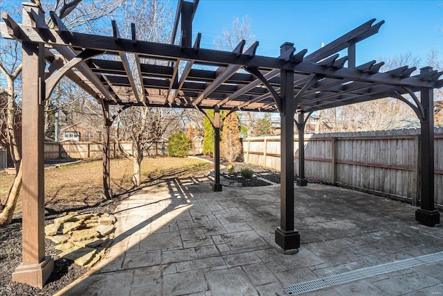 view of patio / terrace with a pergola and a fenced backyard