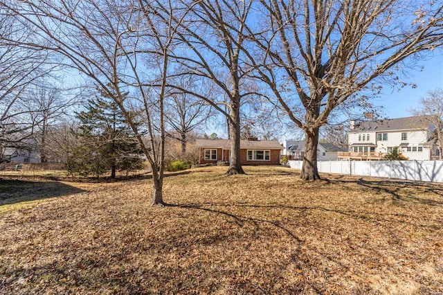 view of yard featuring fence