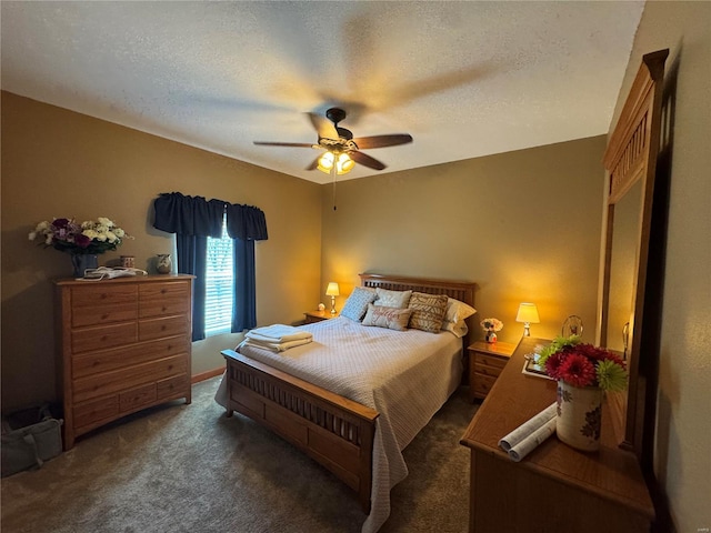 bedroom with carpet, ceiling fan, and a textured ceiling