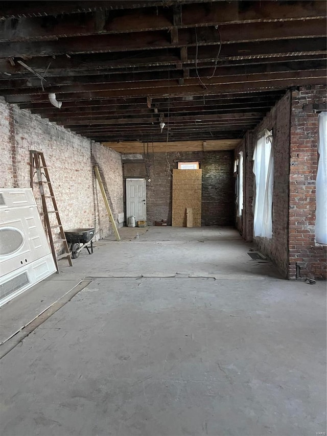 miscellaneous room featuring washer / dryer