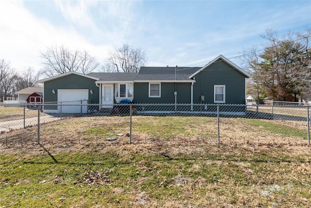 ranch-style house featuring driveway, a front yard, fence private yard, and an attached garage