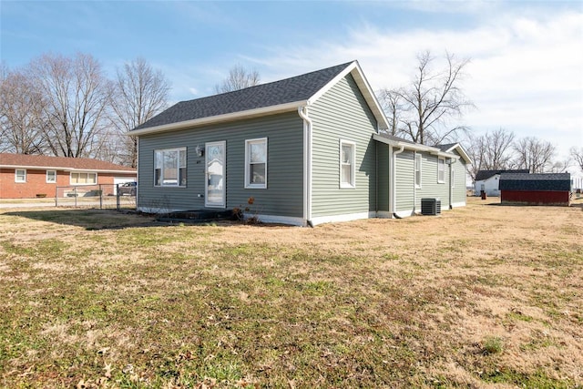 exterior space featuring a yard and fence