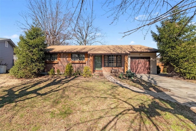 single story home with brick siding, driveway, a front lawn, and a garage