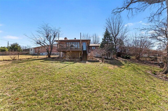 view of yard featuring stairs, a deck, and fence