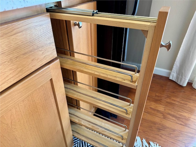 interior details featuring wood finished floors