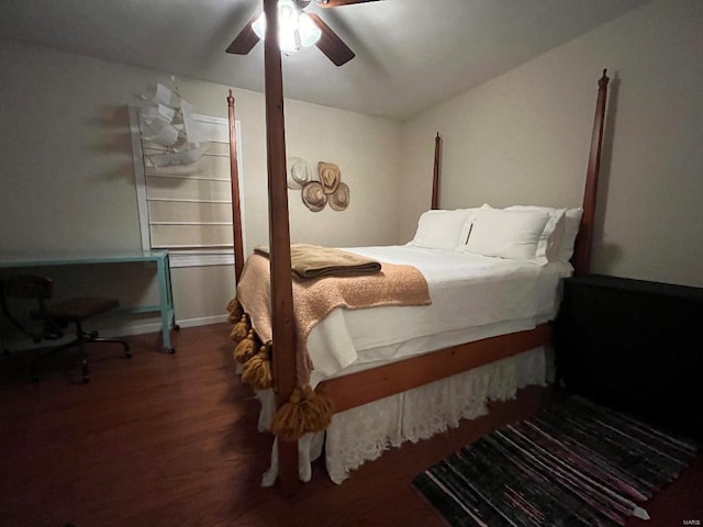 bedroom featuring a ceiling fan and wood finished floors