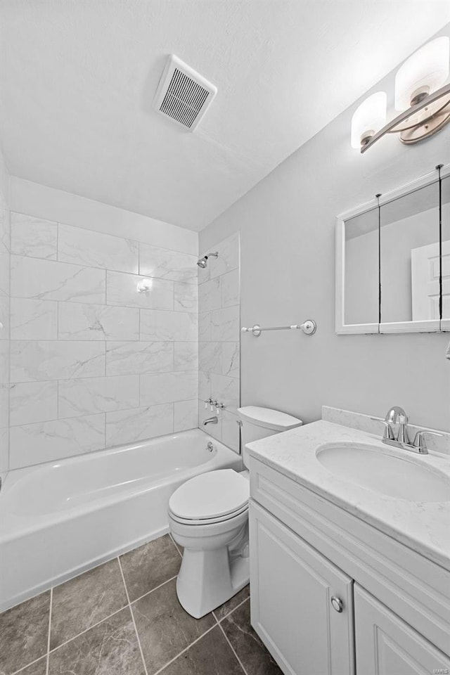 bathroom with vanity, toilet, visible vents, and shower / bathtub combination