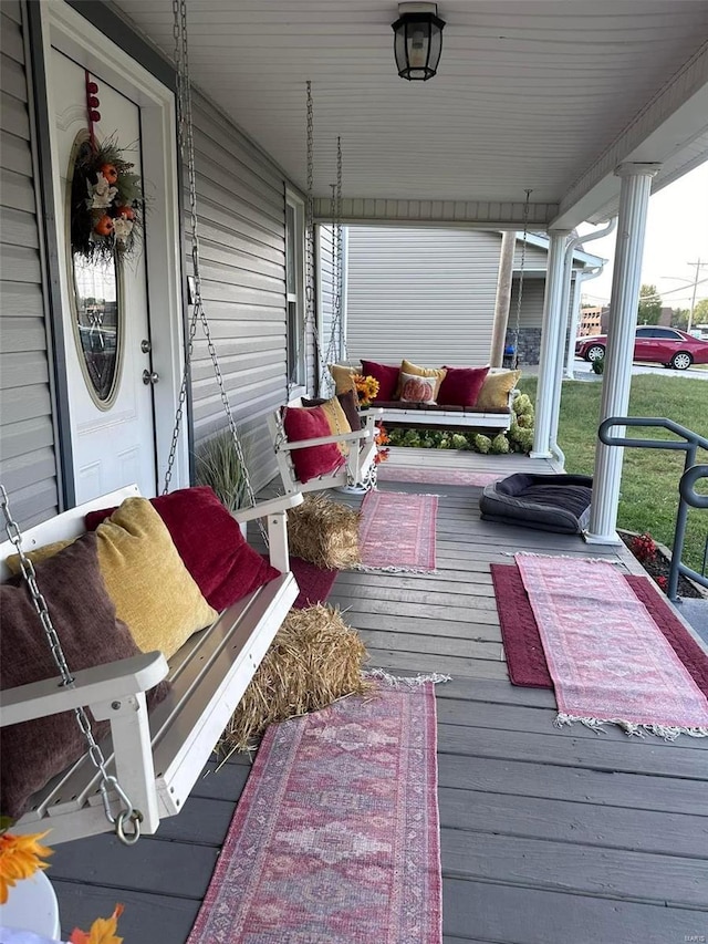 wooden deck featuring a porch