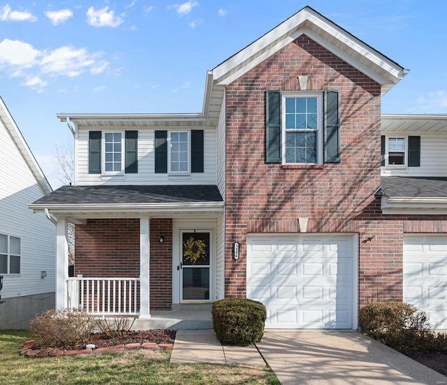 traditional-style home featuring driveway, brick siding, covered porch, and an attached garage