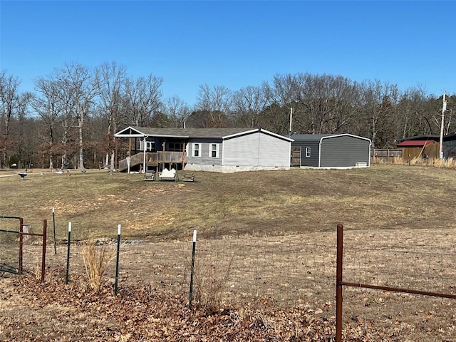 exterior space with crawl space, fence, and a wooden deck