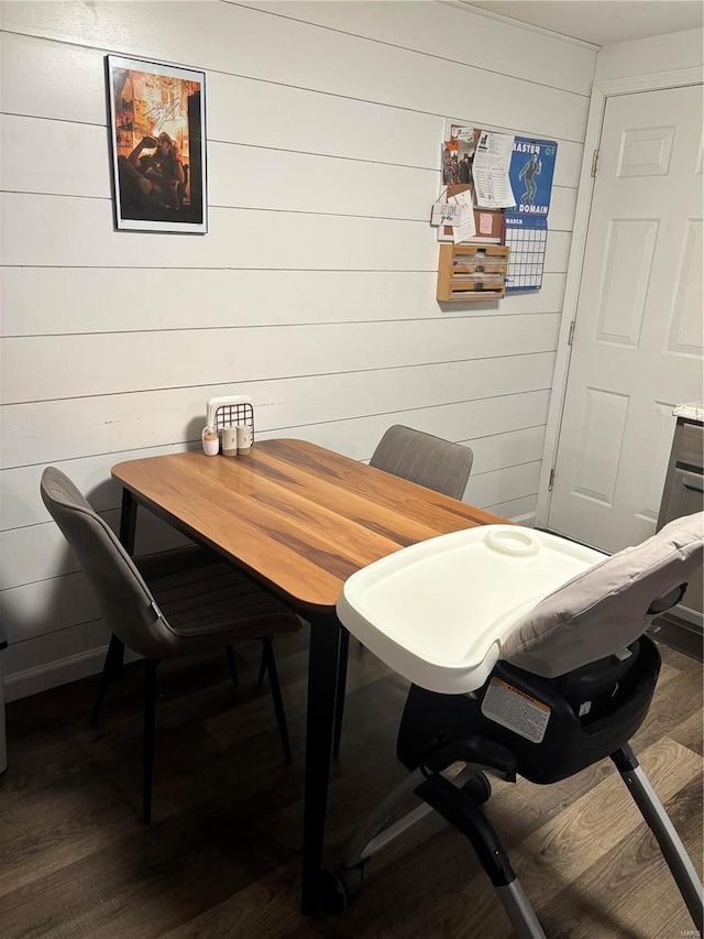 dining room with dark wood-style floors