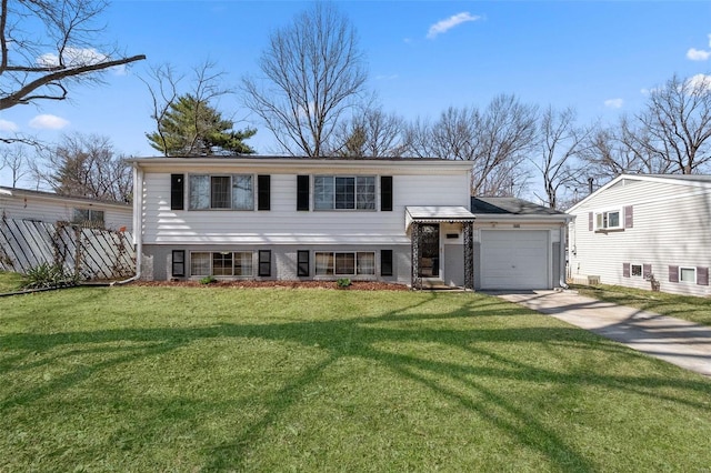 view of front of property with a front lawn, driveway, fence, a garage, and brick siding