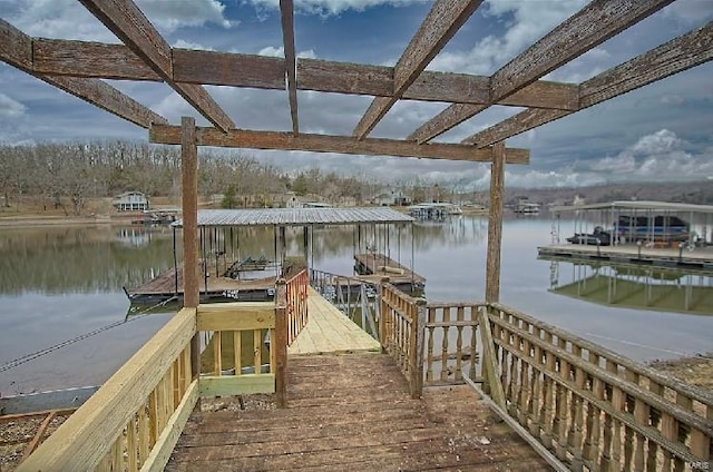 dock area featuring a water view