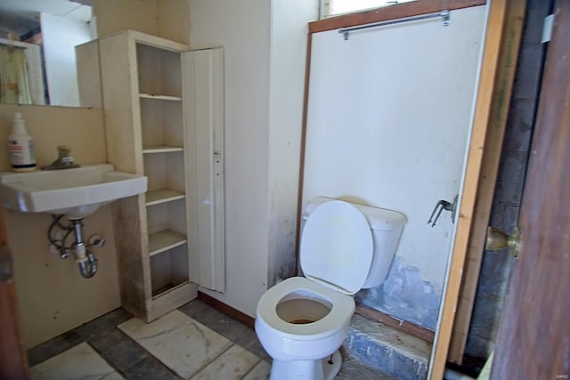 bathroom featuring toilet